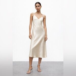 Zara cream satin slip dress with crisscross detail at back. Midi length. Size XS
